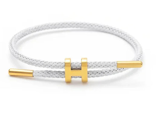 Elegant Flätat Armband med Guld H Spänne