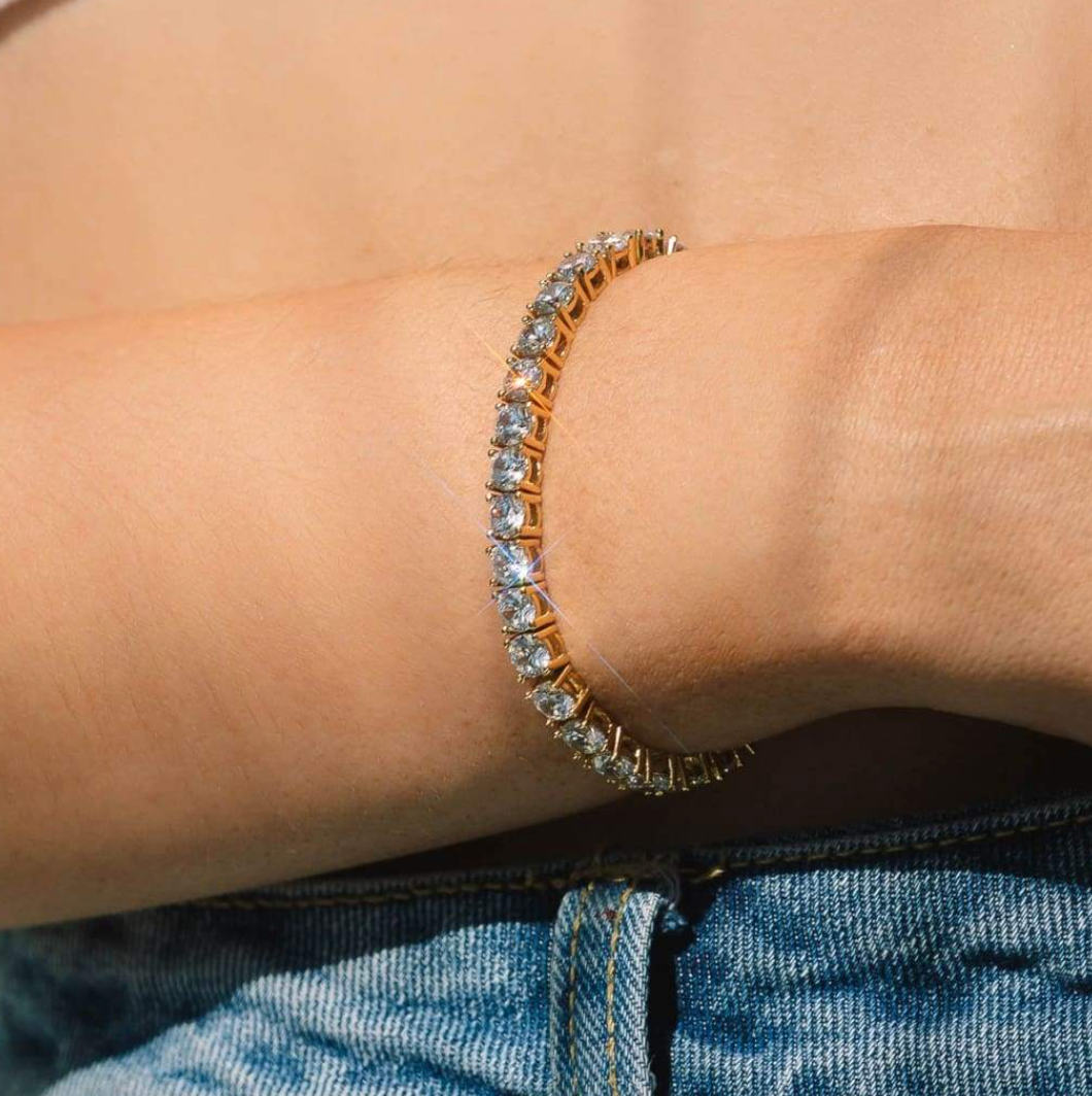 Guldtennisarmband