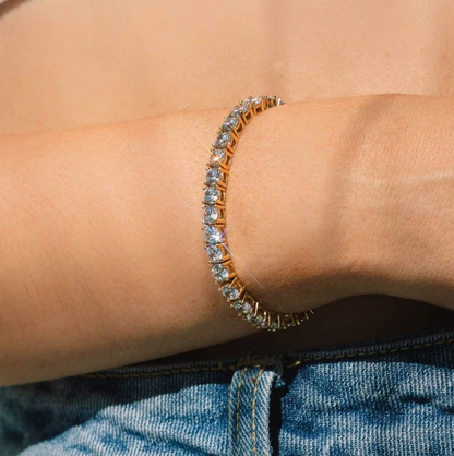 Guldtennisarmband