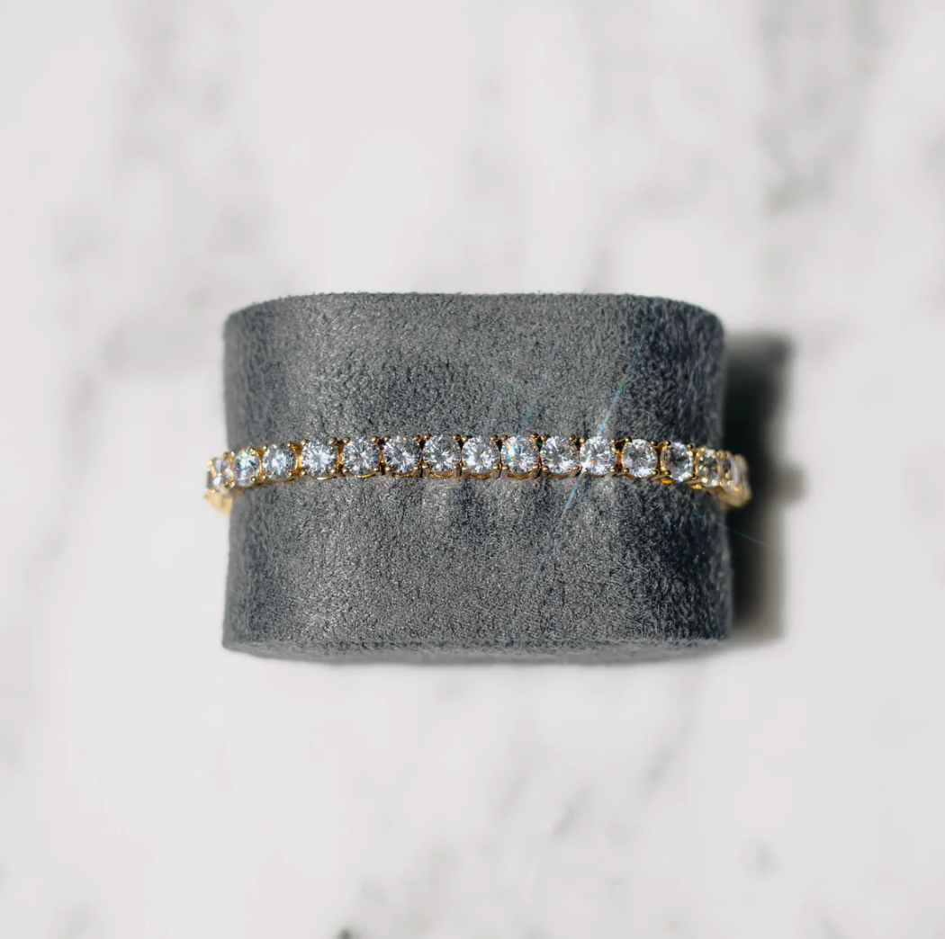 Guldtennisarmband