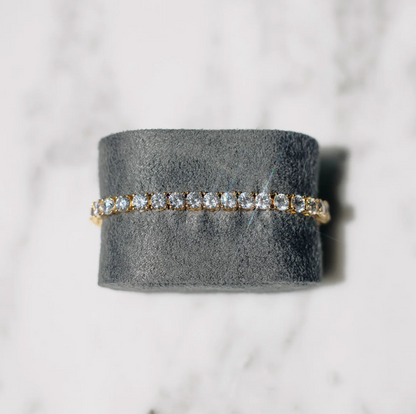 Guldtennisarmband